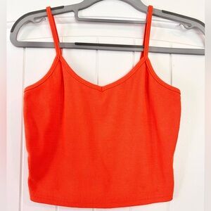Medium bright orange ribbed cropped tank top